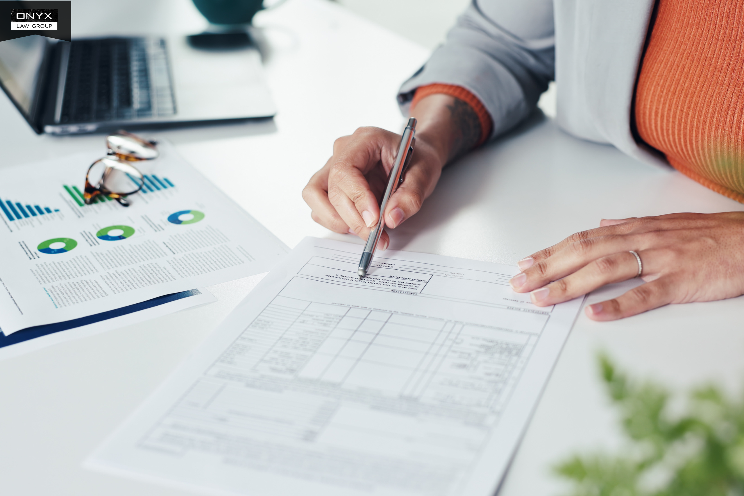 Executor organizing estate documents and reviewing duties such as gathering assets and paying debts.